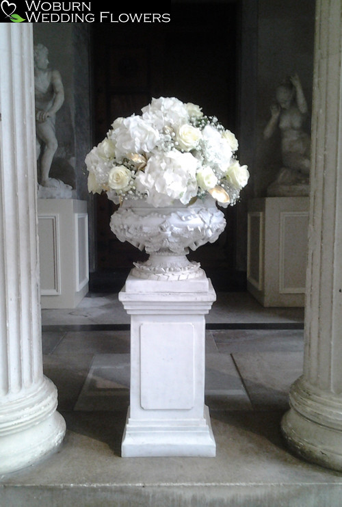 Urn arrangement of Hydrangea, Roses and Gypsophillia at Woburn Sculpture Gallery.