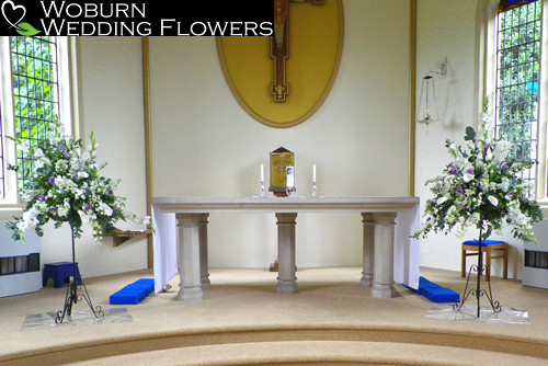 Calla Lilly, Delphinium, Gladioli and Lizzianthus pedestal arrangements at St. Mary's Church, Woburn Sands.