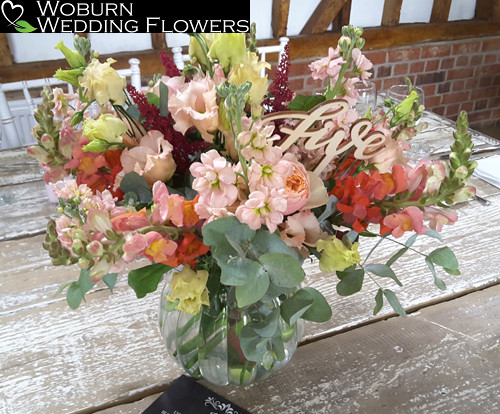 Rose, Astilbe, Snapdragon, Stocks and Lizzianthus in glass jar at the Milling Barn.