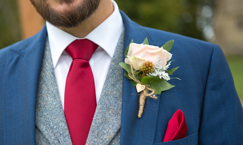 Rustic buttonhole on Groom.